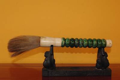 Chinese Brush with Dark Green Oval Stones