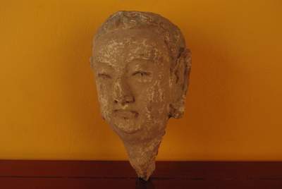 Tête d'une femme Chinoise Tang en Terre Cuite