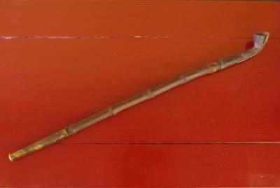 Old Chinese tobacco pipe in wood
