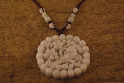 Collier Chinois et son pendentif en Jade Oiseau