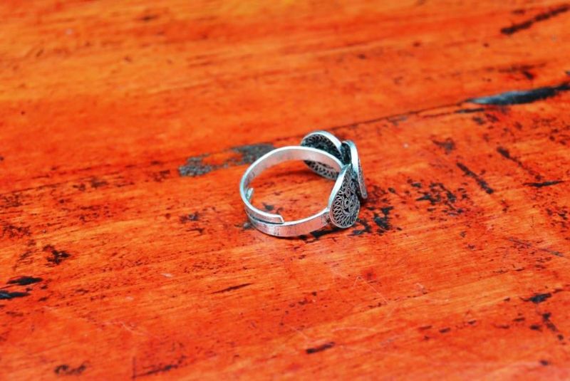 Chinesische Ring der Miao 3 Spirale des Lebens 4