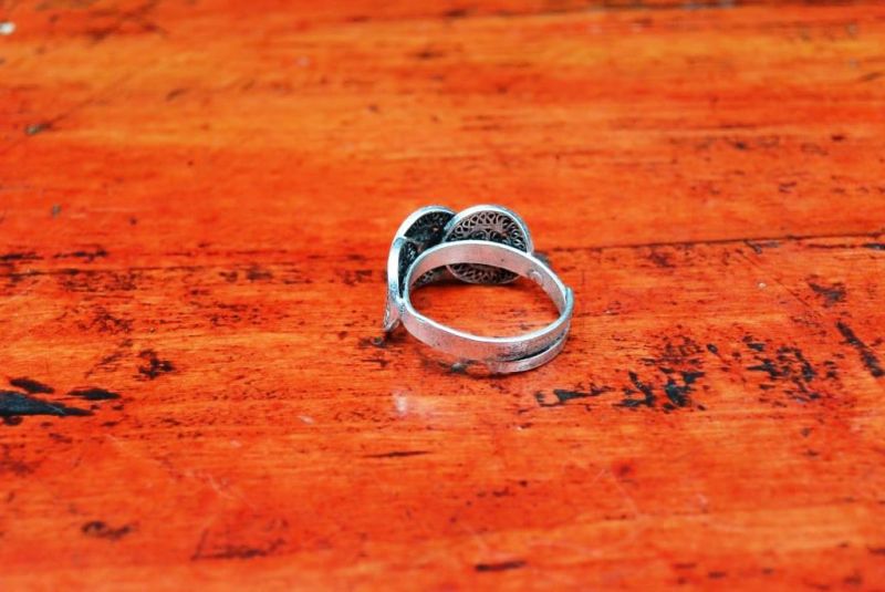 Chinesische Ring der Miao 3 Spirale des Lebens 5