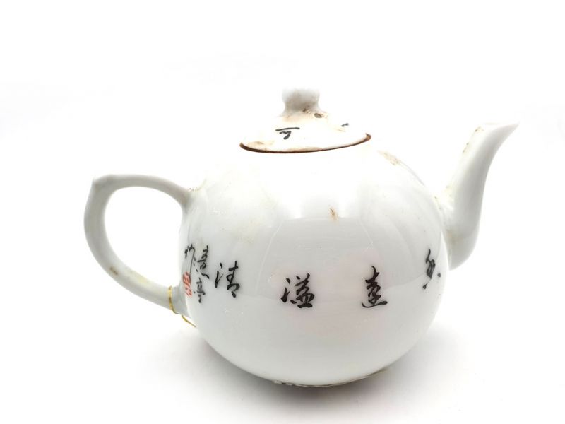 Chinesische Teekanne aus Porzellan Vogel auf einem Lotus 3