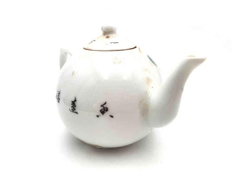 Chinesische Teekanne aus Porzellan Vogel auf einem Lotus 4