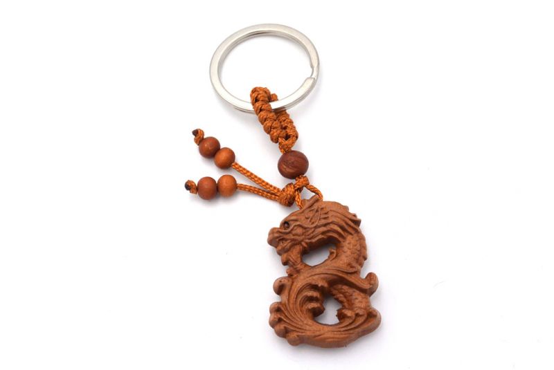 Feng Shui Keyring in wood - The dragon and the eight 1