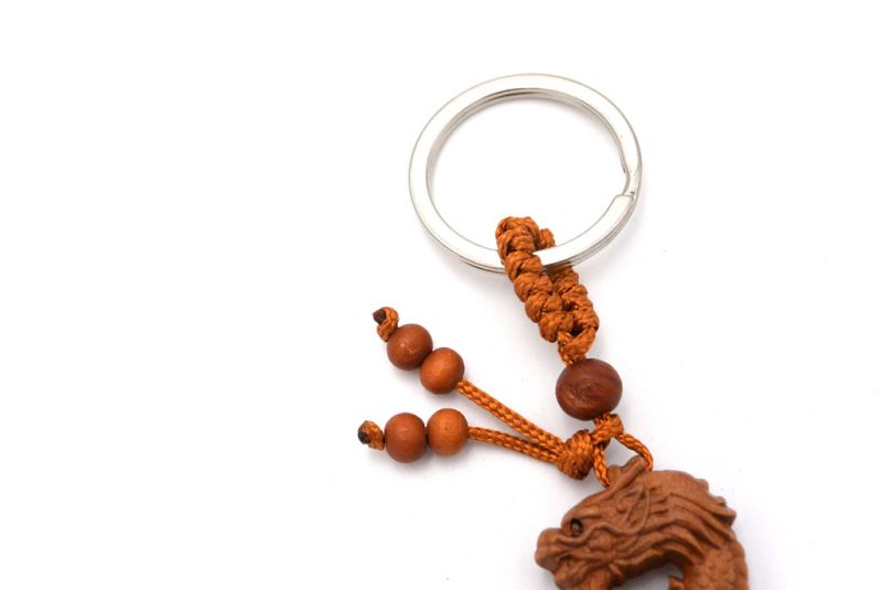 Feng Shui Keyring in wood - The dragon and the eight 3