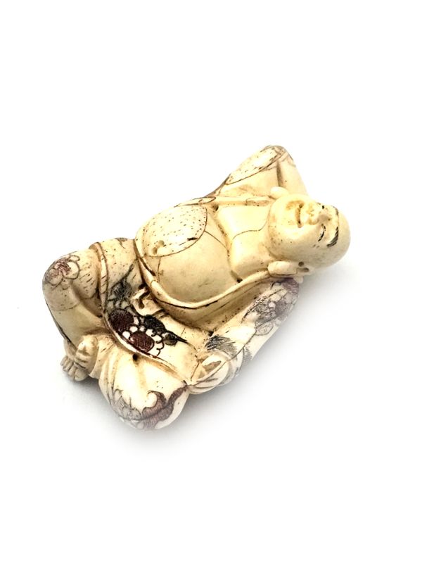 Japanese Netsuké in Bone - Buddha resting 1