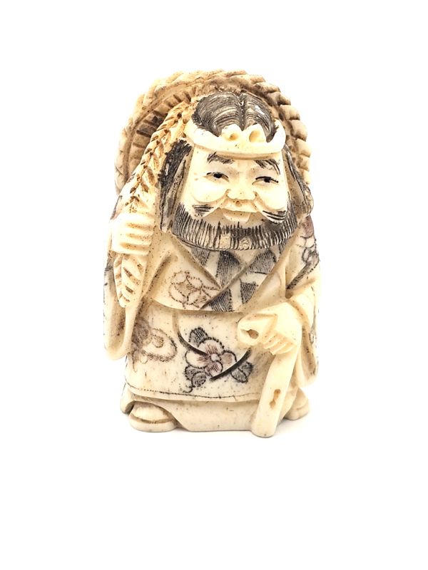 Japanese Netsuké in Bone - The rice field peasant 1