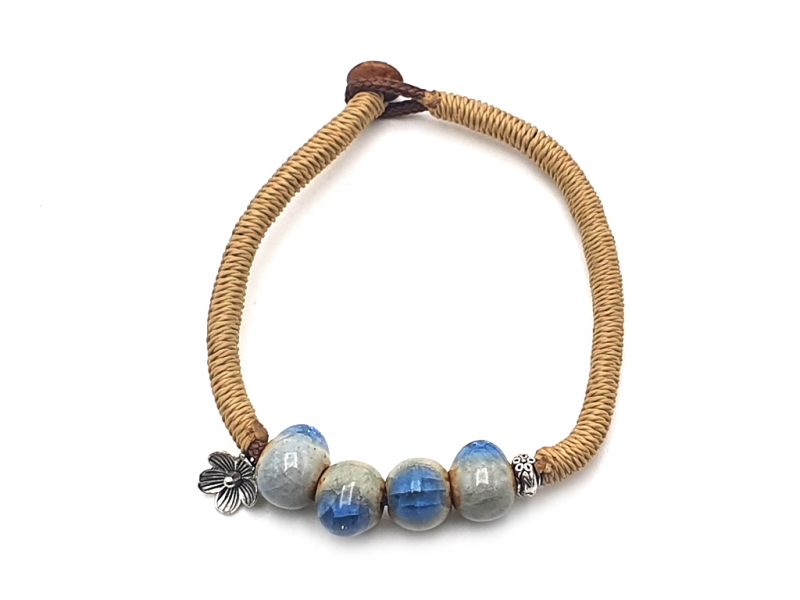 Joyas de cerámica / porcelana - Pulsera pequeña - 4 cuentas azules + 1 flor 1