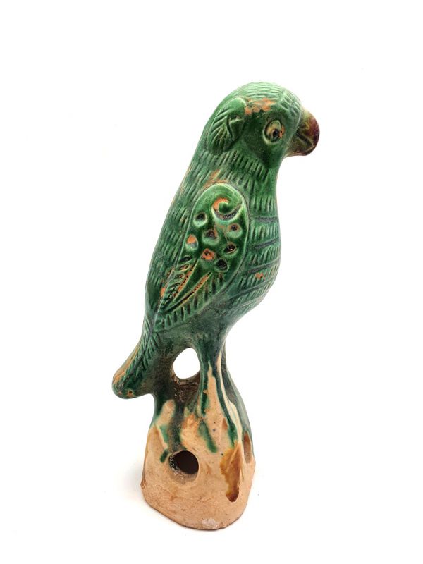 Loro de terracota con el esmalte verde S 2