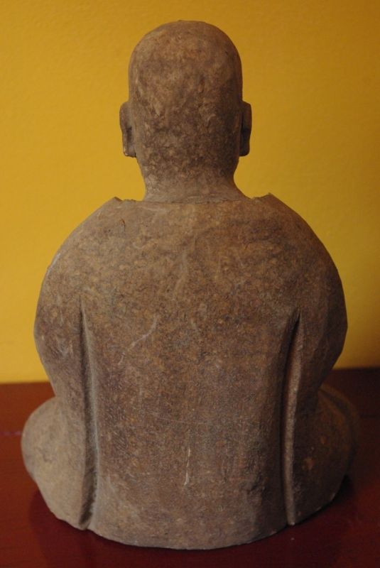 Statue of a Buddhist monk in prayer position 5
