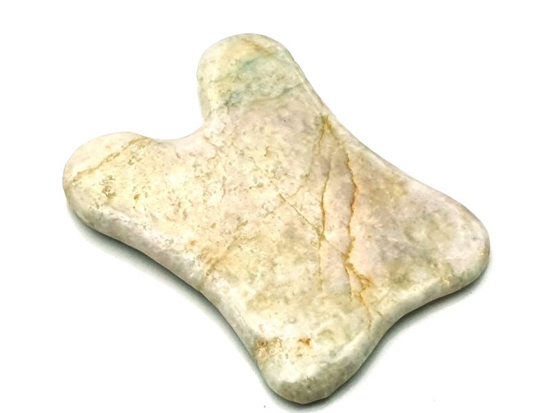 Traditional Chinese medicine - Gua Sha concave in Jade - light green with yellow/brown reflections 2